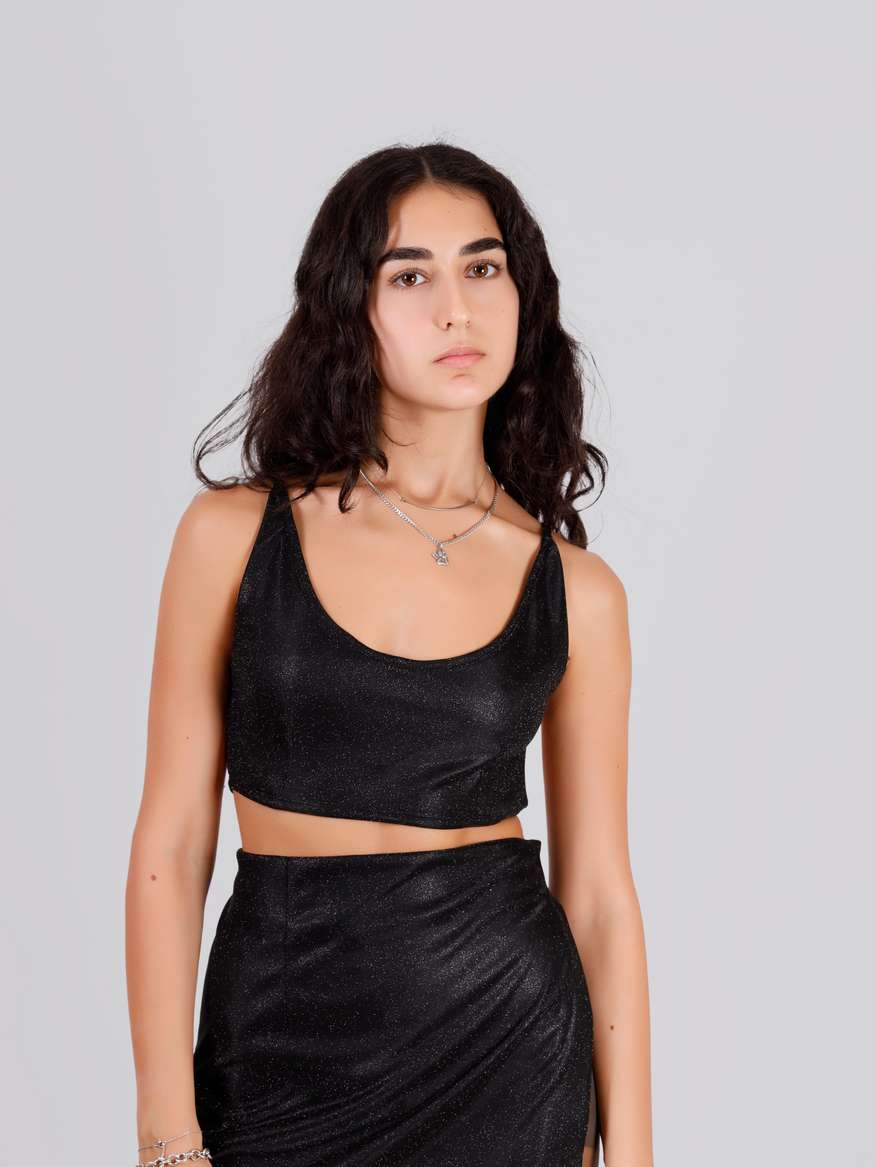 Buy the Black Glitter Crop Top FEMME FIERCE LEMONADE FASHION by FEMME FIERCE LEMONADE FASHION