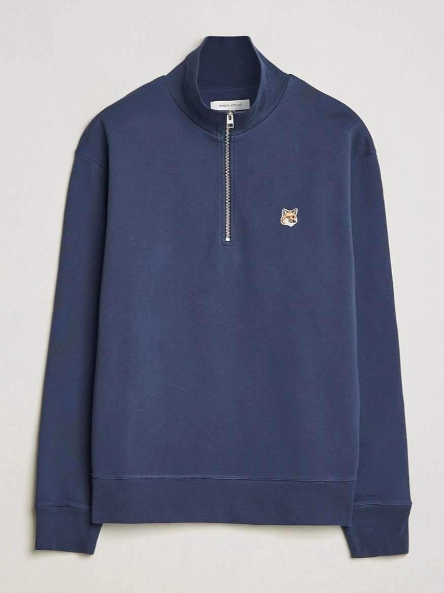 躑躅. Fox Head Half Zip Sweatshirt in Ink Blue by Maison Kitsuné